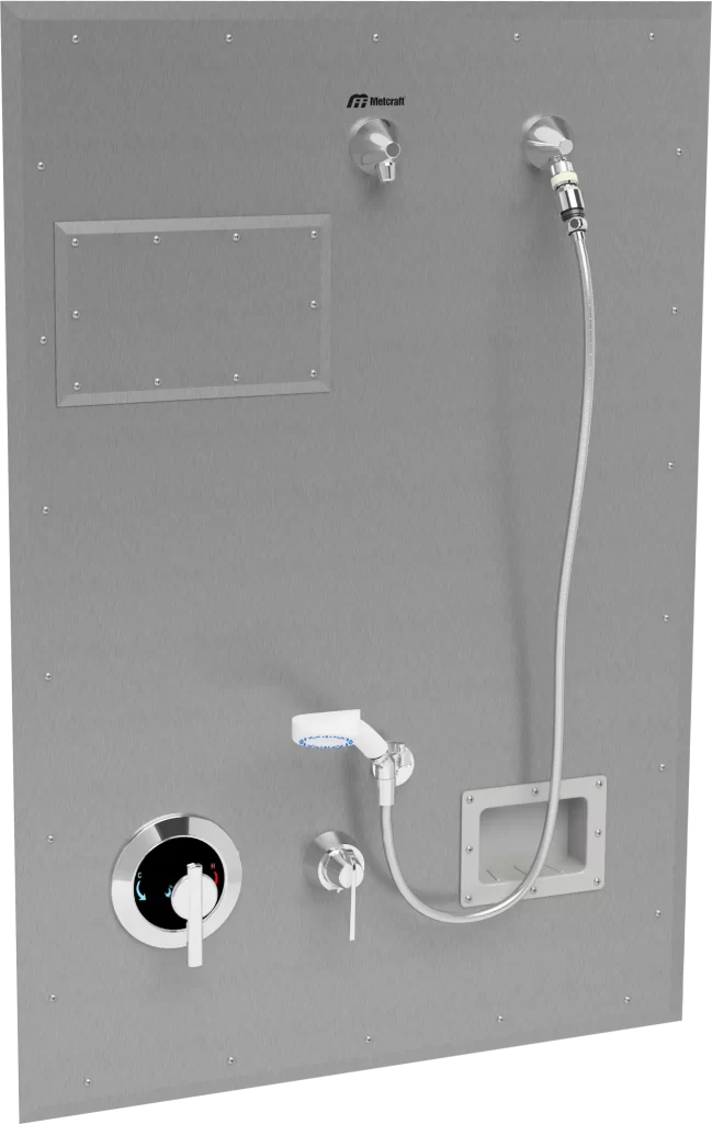 A stainless steel wall panel shower with controls, shower head, and a soap alcove.